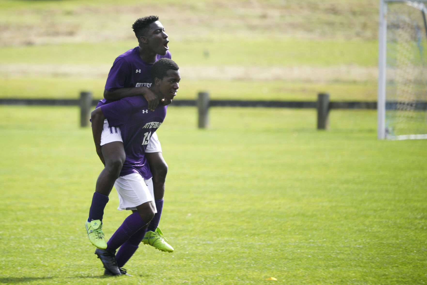 Jonathan Ofori gives Nick Apprey piggyback ride